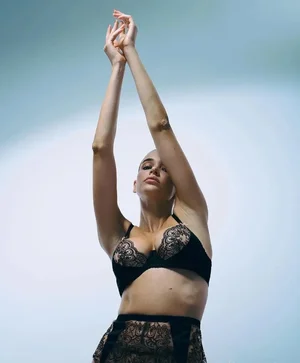 Em